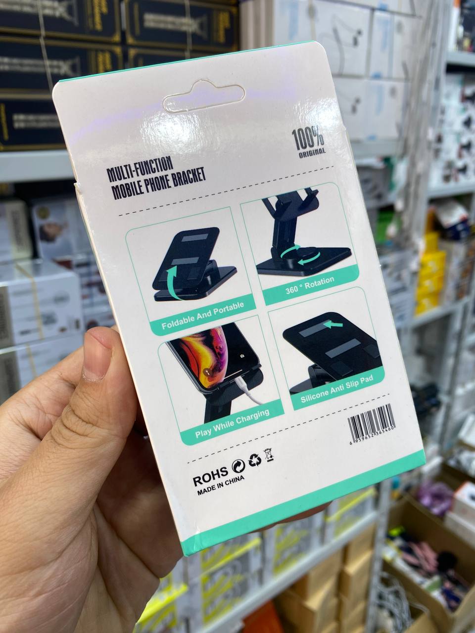 Multi-function mobile phone bracket Support multifonction pour téléphone portable حامل هاتف محمول متعدد الوظائف