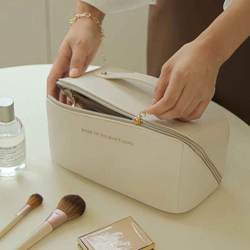 Sac à cosmétiques, trousse organisateur d'articles de toilette حقيبة مستحضرات التجميل، حقيبة تنظيم أدوات الزينة للنساء