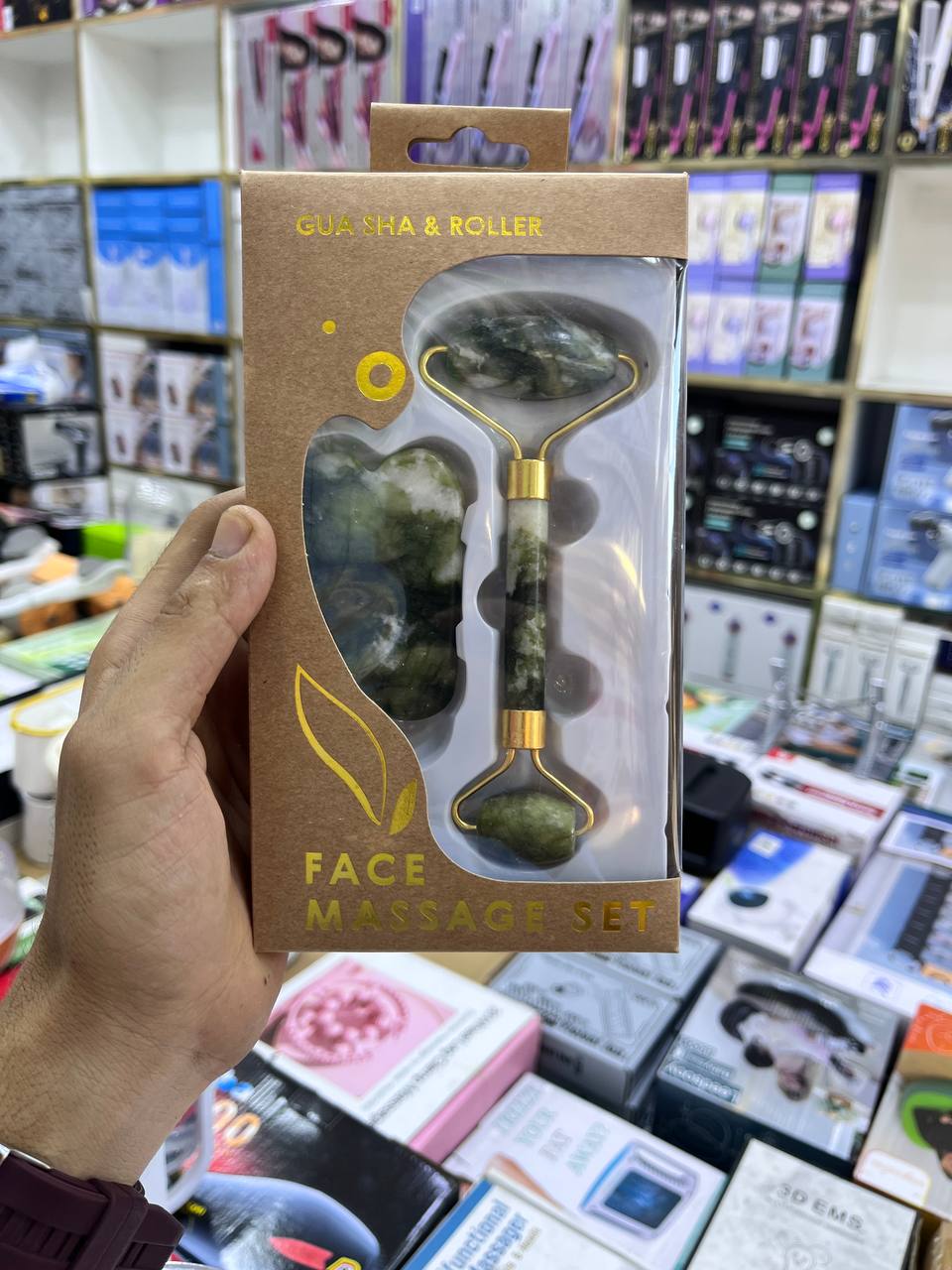 حجر طبيعي لعلاج التجاعيد وإزالة السموم وشد البشرة Ensemble de massage facial avec rouleau de jade et Gua Sha
