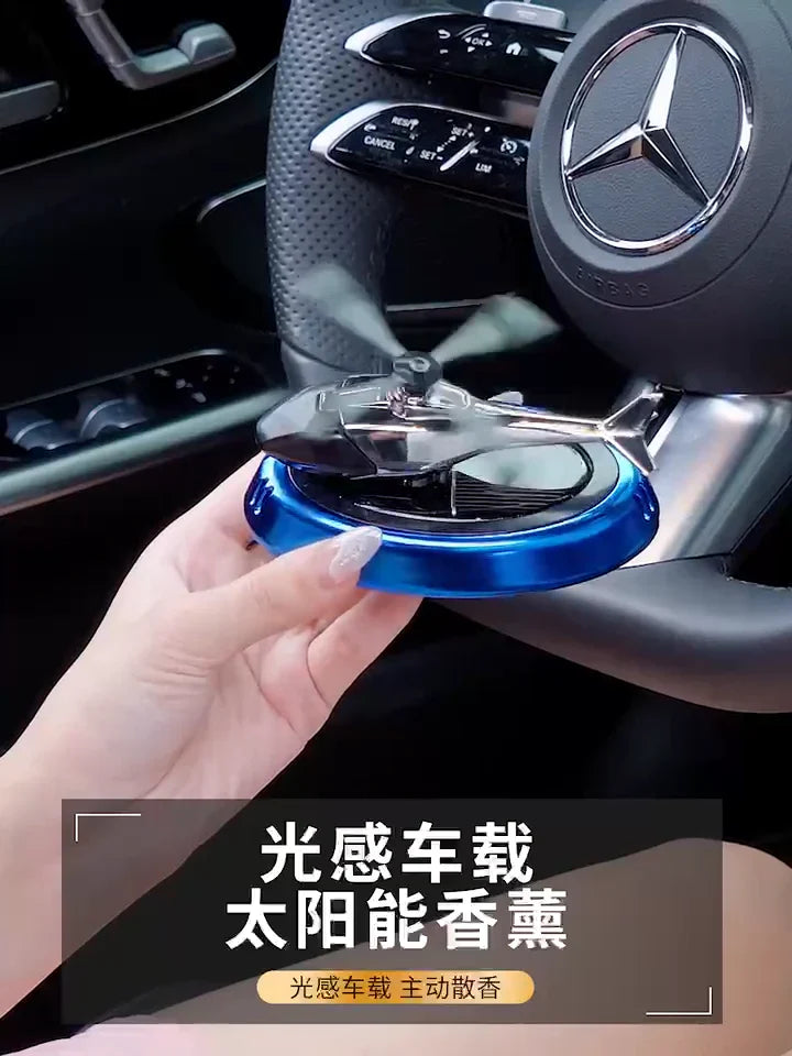 معطر جو للسيارة يعمل بالطاقة الشمسية على شكل طائرة هليكوبتر Diffuseur de parfum solaire pour voiture a la forme d'un hélicoptère