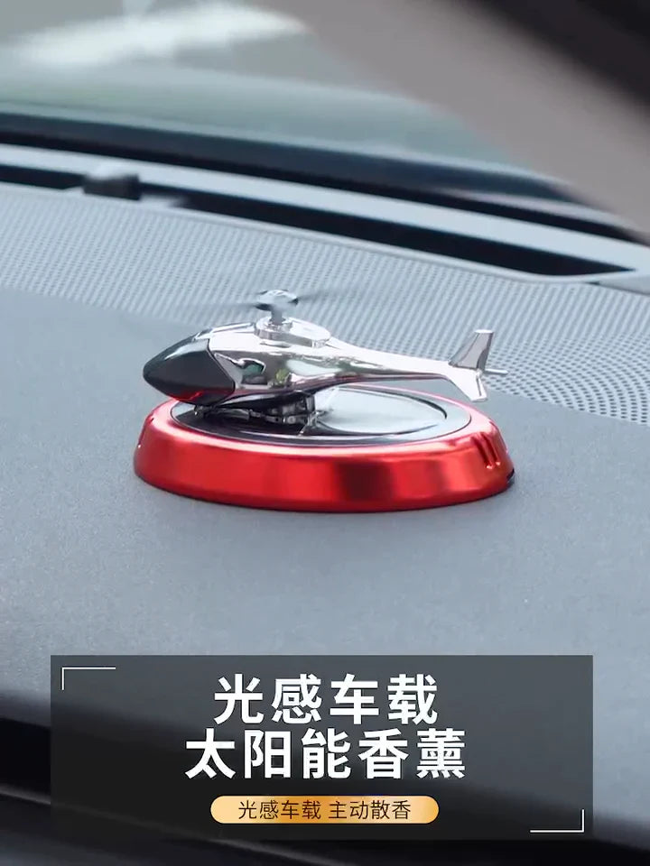 معطر جو للسيارة يعمل بالطاقة الشمسية على شكل طائرة هليكوبتر Diffuseur de parfum solaire pour voiture a la forme d'un hélicoptère