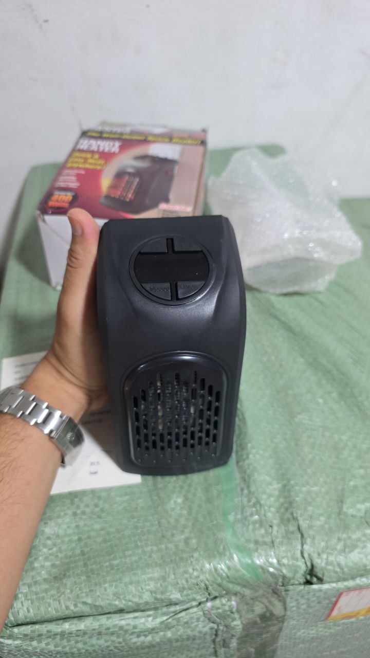 Handy heater Wall outlet space 400W Chauffageمدفأة صغيرة واقتصادية محمولة  400واط