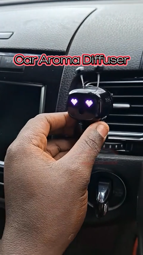 معطر سيارة على شكل روبوت موزع عطر صامت يدوم طويلاً Désodorisant de voiture en forme de robot Diffuseur de parfum silencieux