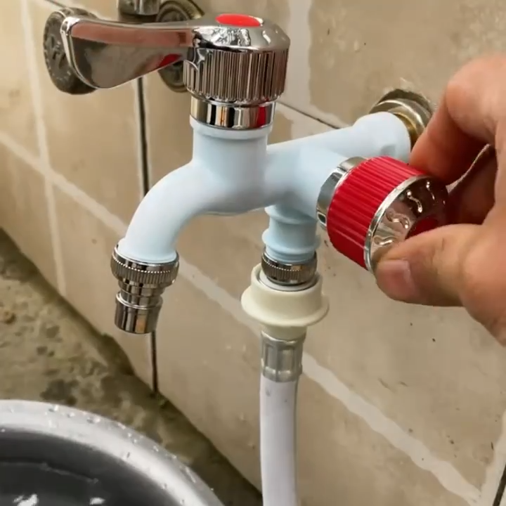 Double headed faucet Robinet à double tête صنبور ذو رأسين