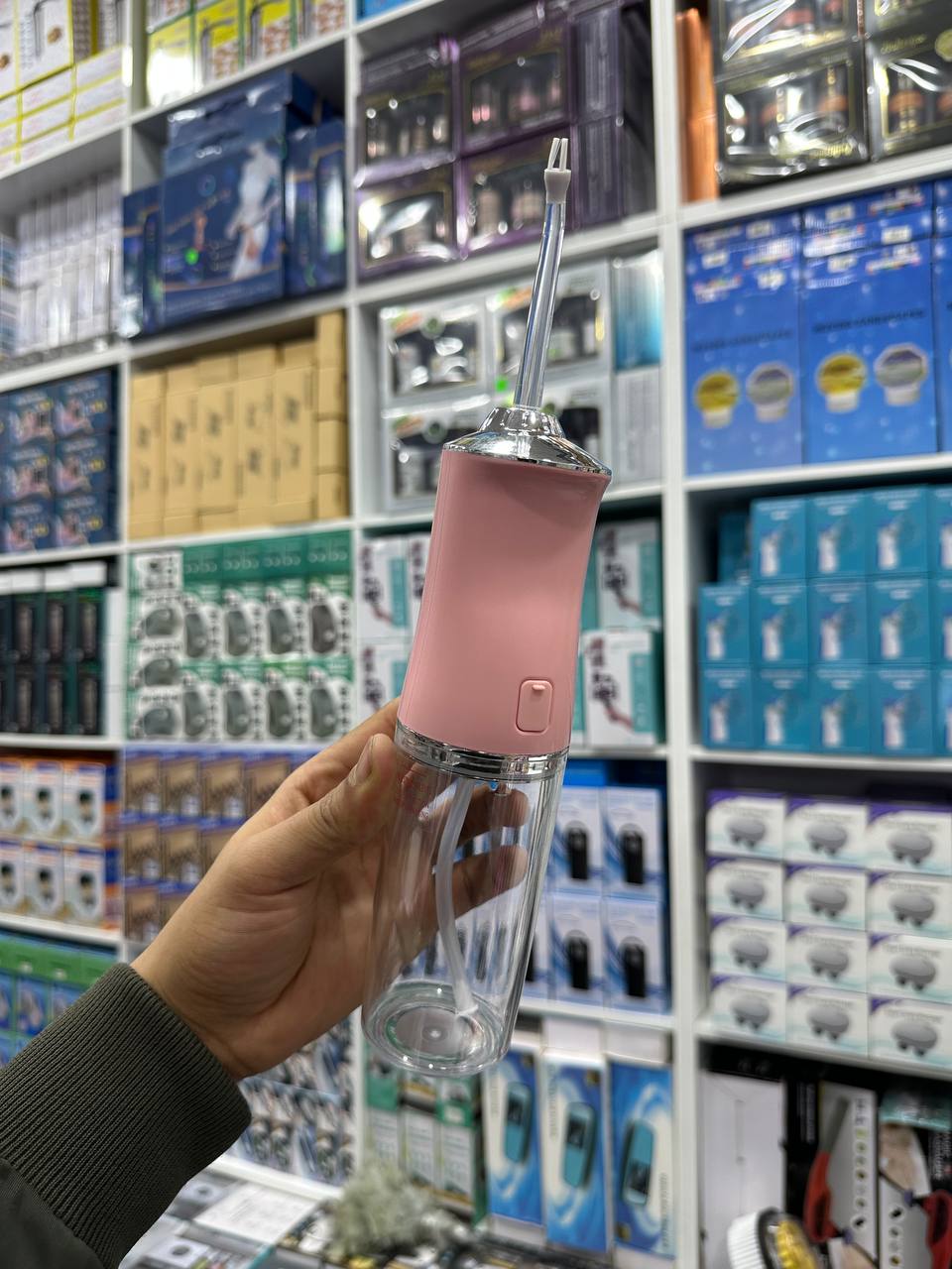 Portable oral irrigator جهاز ري الفم المحمول