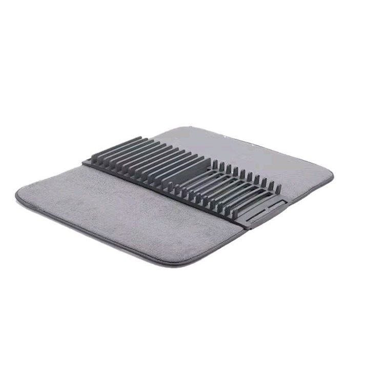 مصفاة أطباق صغيرة الحجم على شكل حصيرة Egouttoir à vaisselle compact de type tapis ou support pliable