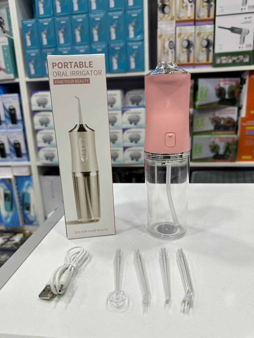 Portable oral irrigator جهاز ري الفم المحمول
