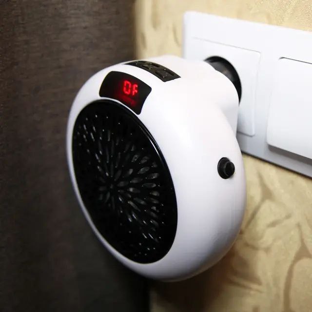 The wall outlet portable Heater Warm air blower سخان محمول بمنفذ الحائط ومنفاخ هواء دافئ