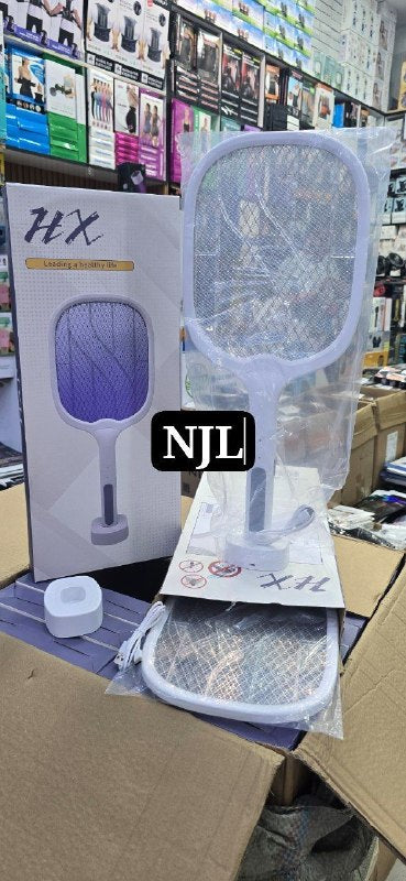 مضرب ذباب كهربائي مصمم للقضاء على الحشرات الطائرة Tapette à mouches électrique conçue pour éliminer les insectes