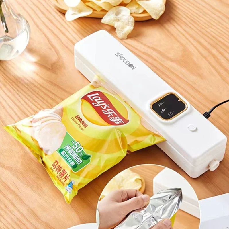 Machine à emballer sous vide pour conservation des aliments آلة تغليف بالتفريغ الهوائي لحفظ الطعام