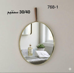 مرآة حائط دائرية بتصميم أنيق وبسيط، قطعة ديكور Miroir mural rond au design épuré et élégant pièce décorative