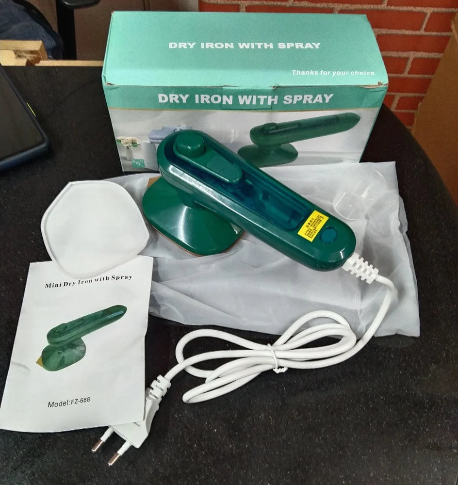 مكواة جافة مع رذاذ Dry iron with spray Repassage à sec avec spray