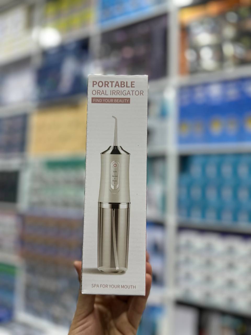 Portable oral irrigator جهاز ري الفم المحمول
