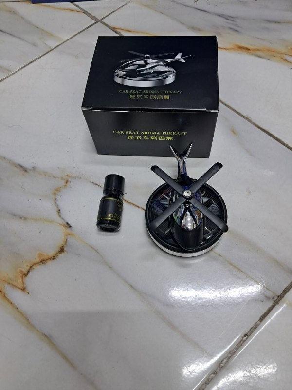Car Seat Aroma Therapy هذا المعطر بشكل المروحية