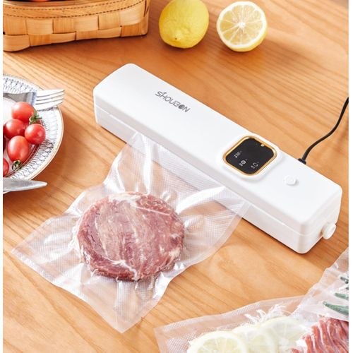 Machine à emballer sous vide pour conservation des aliments آلة تغليف بالتفريغ الهوائي لحفظ الطعام