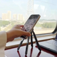 Support pliable multifonctionnel 4 en 1 pour smartphones, tablettes et ordinateurs portables حامل متعدد الوظائف قابل للطي 4 في 1 للهواتف الذكية والأجهزة اللوحية وأجهزة الكمبيوتر المحمولة